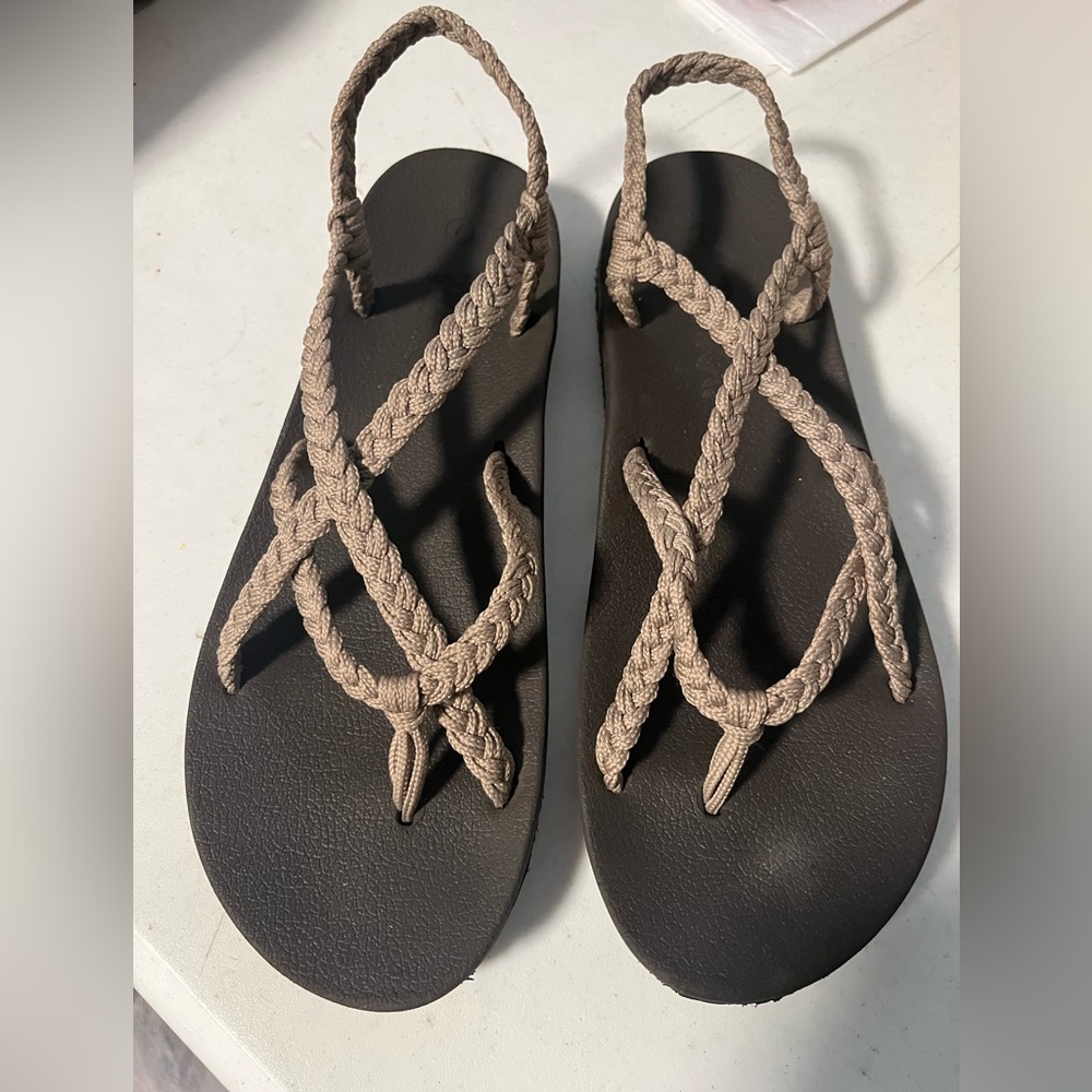 Plaka strapped sandals, size 7. Pre-owned in excellent condition.
